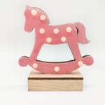 ^ "WOODEN PINK HORSE"
